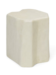 White ceramic table with a textured surface on a white background