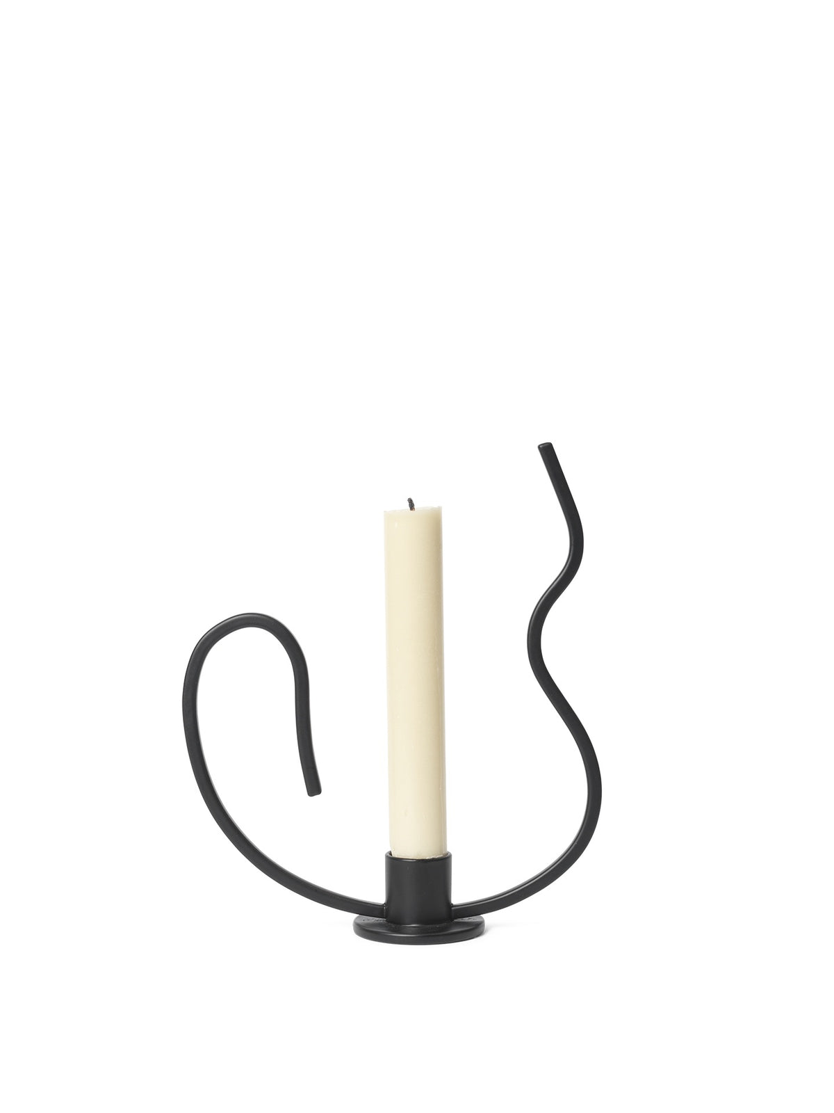 Black candle holder with a white candle on a white background