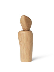 Wooden sculpture on a white background salt and pepper