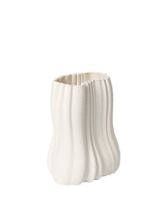 White ceramic vase with textured surface on a white background