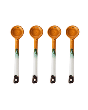 Four ceramic spoons with painted handles on a white background