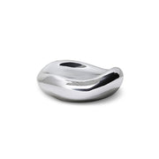 Silver decorative object on a white background