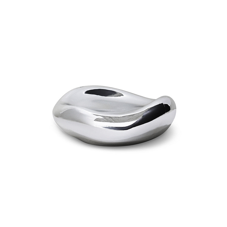 Silver decorative object on a white background