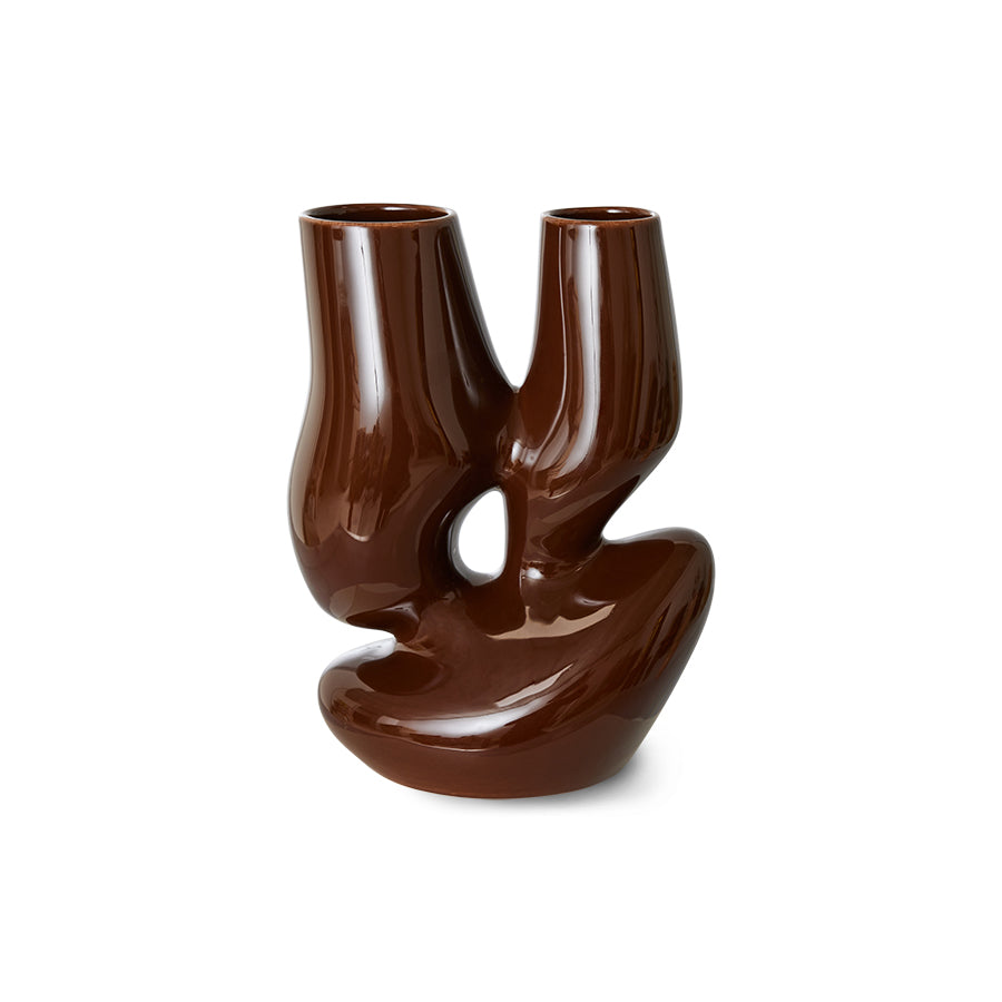 Brown ceramic vase with unique design on a white background