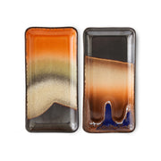 Two rectangular ceramic plates with gradient colors on a white background
