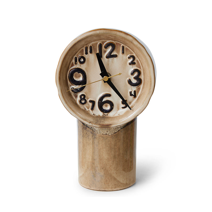 Decorative retro clock with a wooden base on a white background