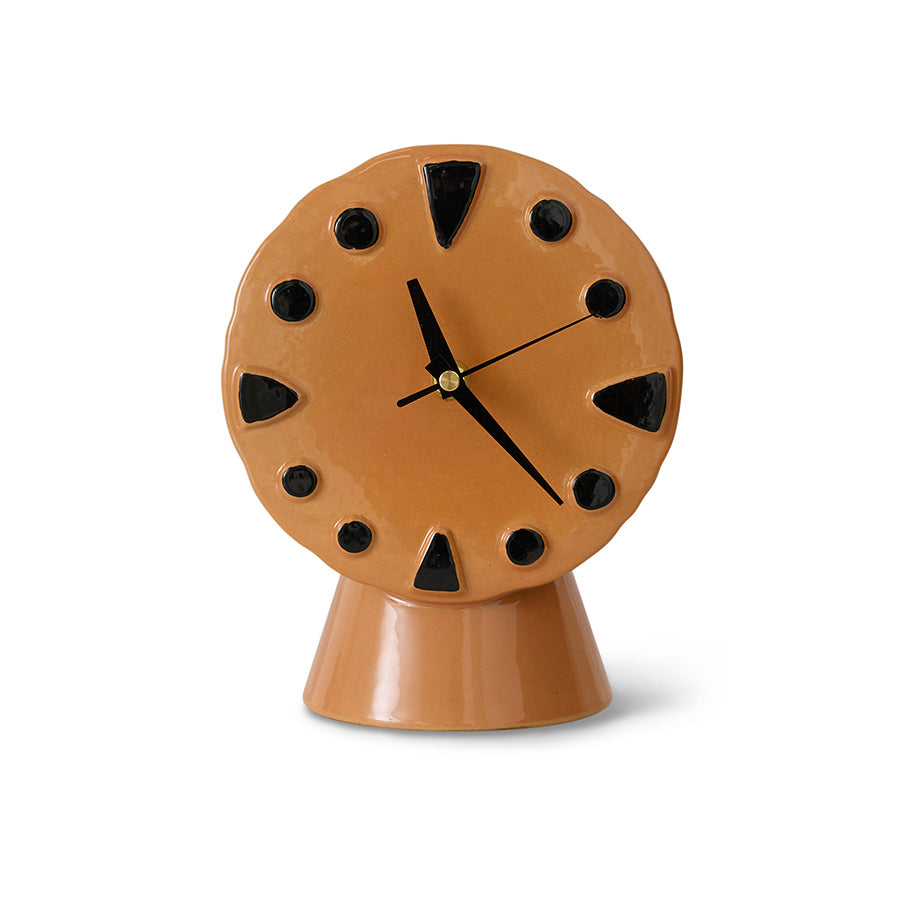 Round brown retro clock with black accents on a white background