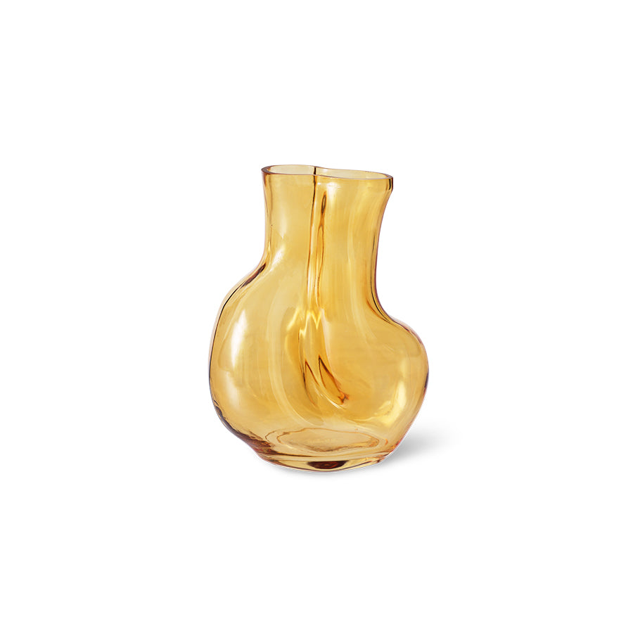 Amber glass vase on a white background