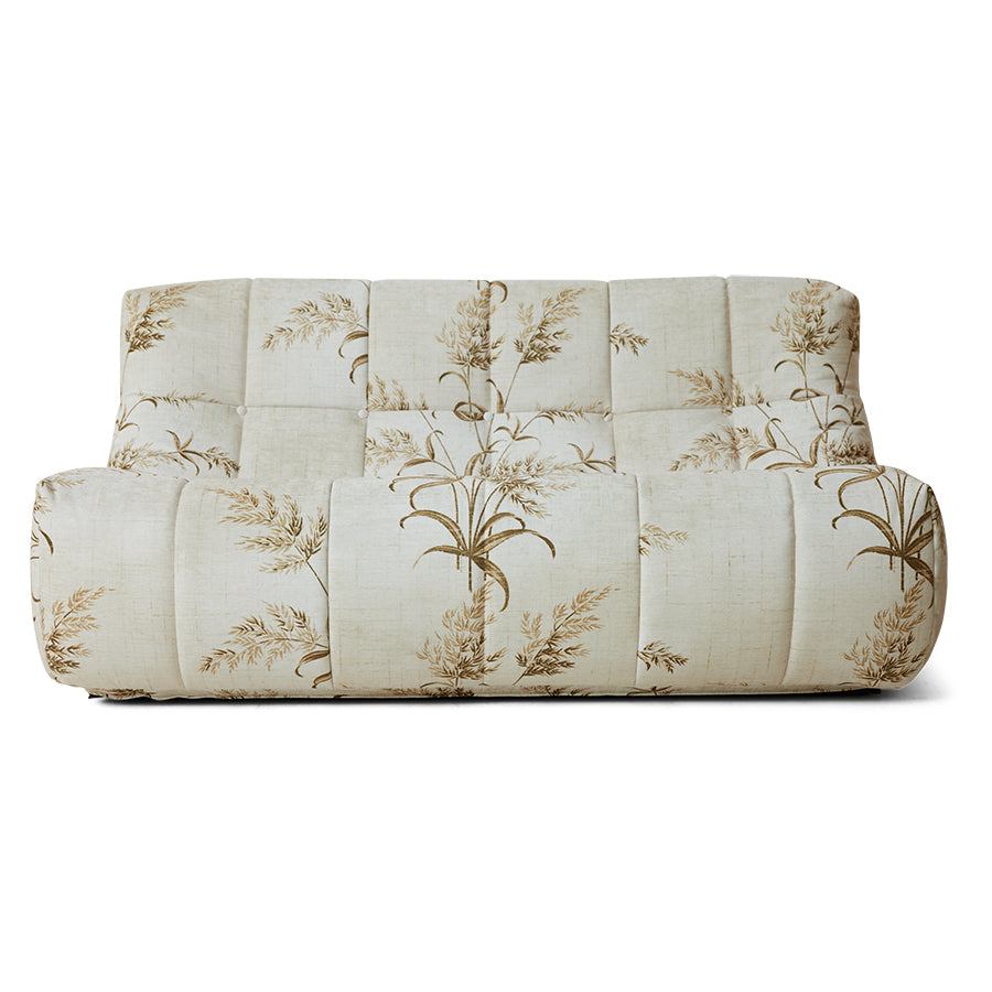 Folded floral-patterned lazy lounge sofa on a white background