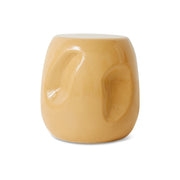 Yellow ceramic coffee table on a white background