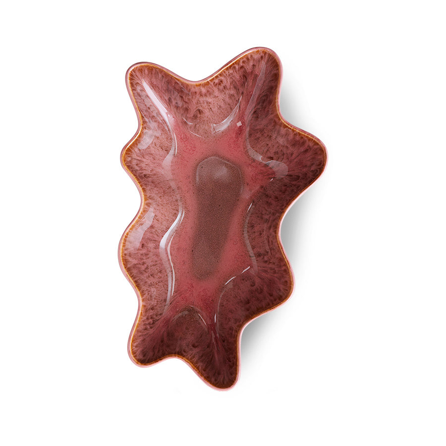 Wavy red ceramic  shell dish bowl on a white background