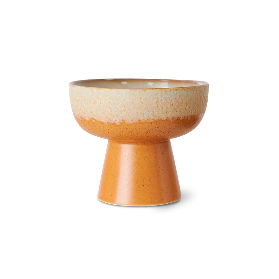 Ceramic bowl with a textured surface on a white background