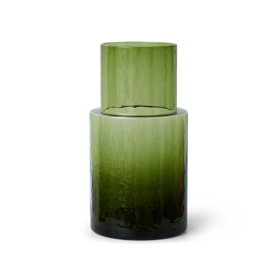 Green glass vase on a white background