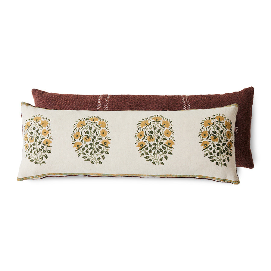 Decorative pillow with floral patterns on a white background