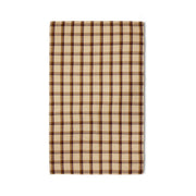 Beige and brown plaid table cloth on a white background