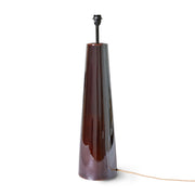 Tall, dark brown floor lamp base with a white background