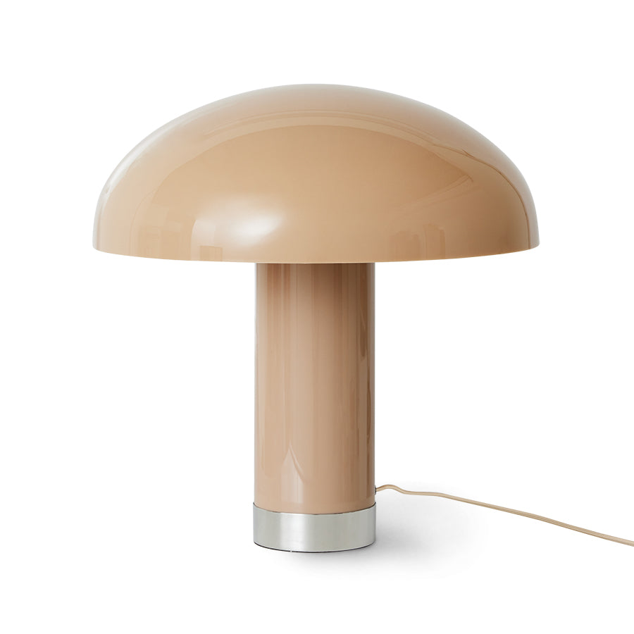 Beige table lamp with a metallic base on a white background