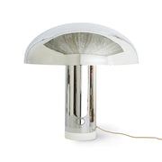Modern table lamp with metallic finish on a white background